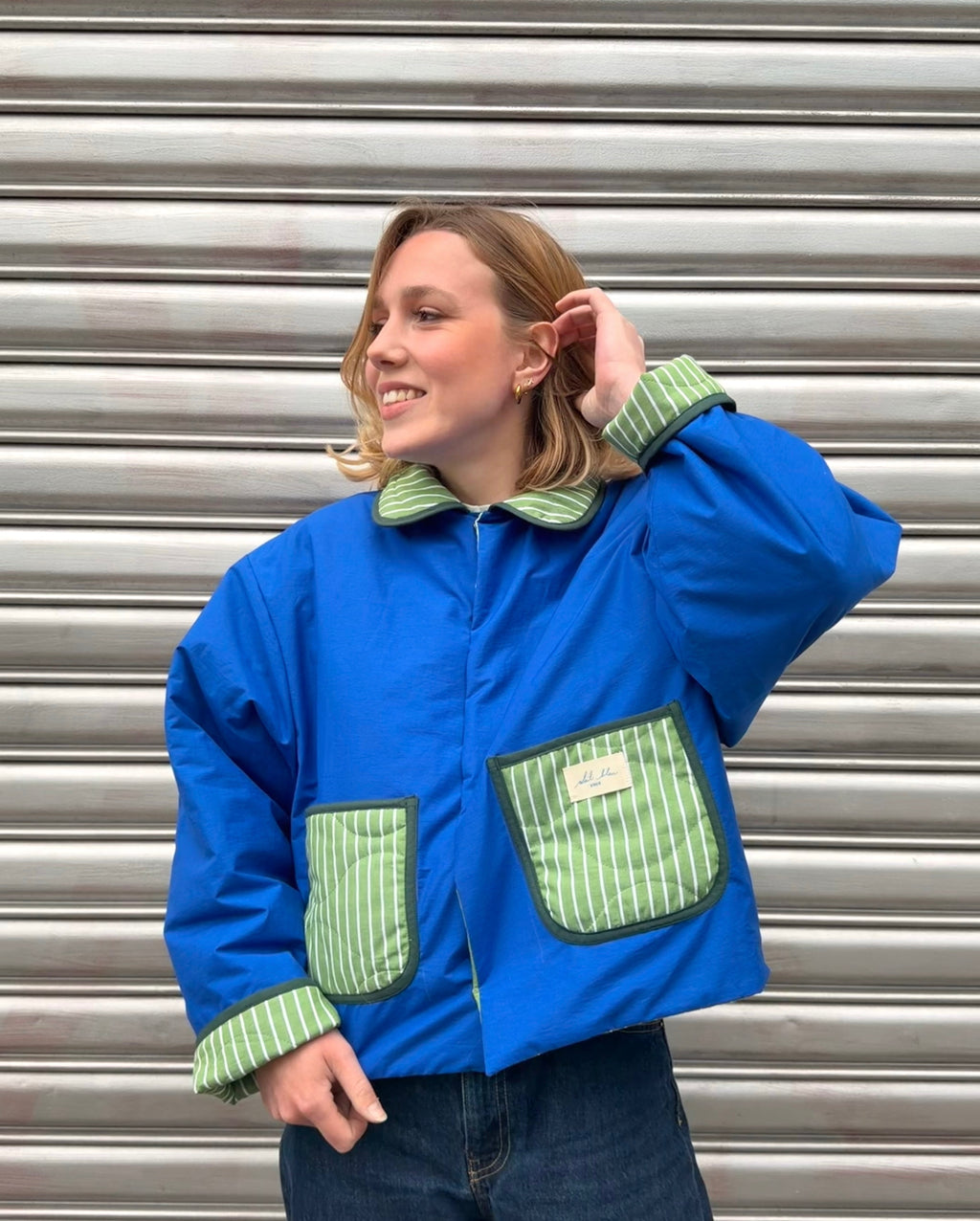 Veste matelassé réversible vert ligné/bleu