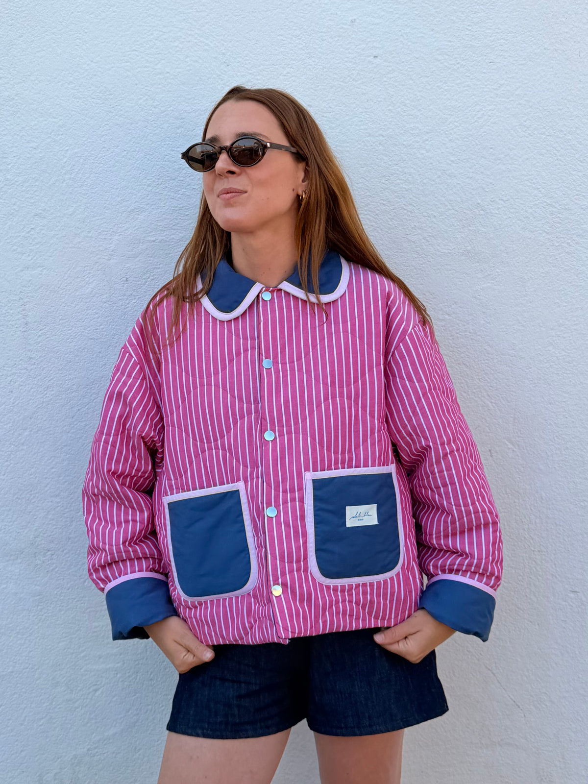 Veste réversible matelassée rose ligné/bleu nuit/biais rose pale