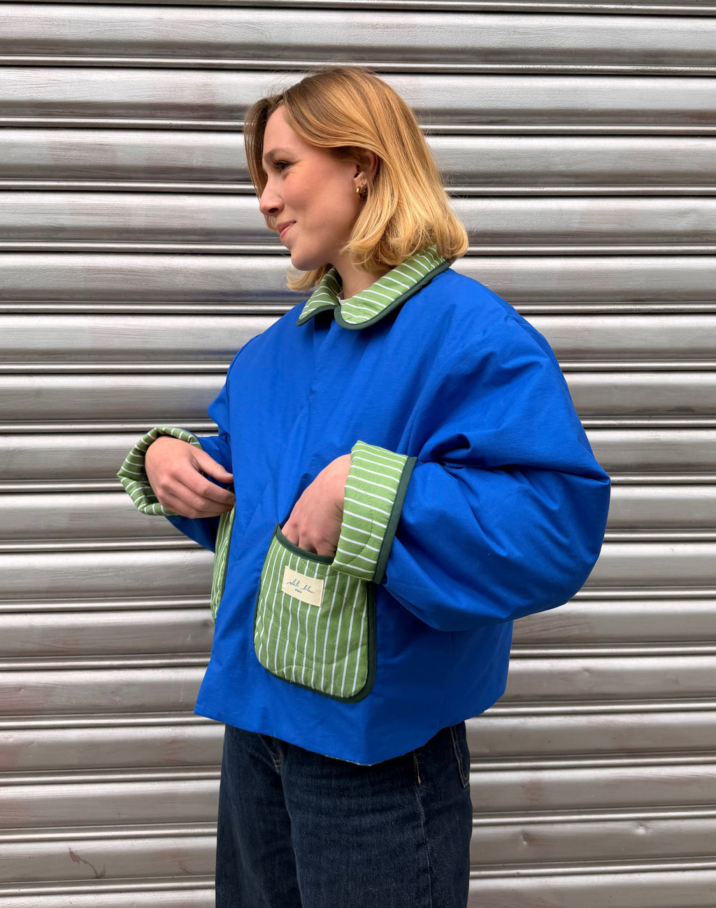Veste matelassé réversible vert ligné/bleu
