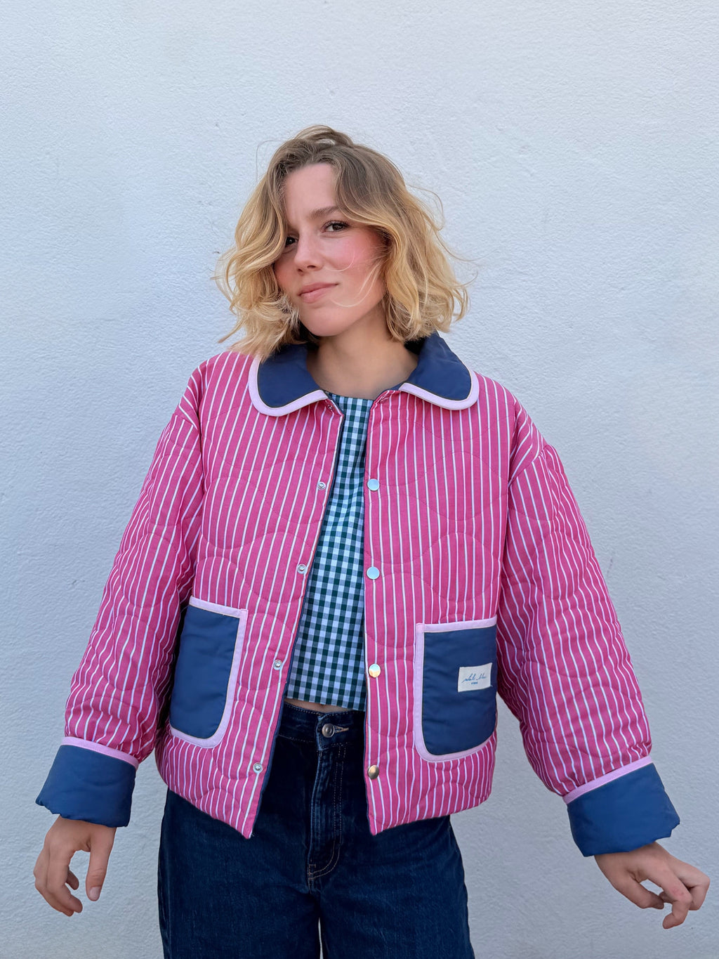 Veste réversible matelassée rose ligné/bleu nuit/biais rose pale
