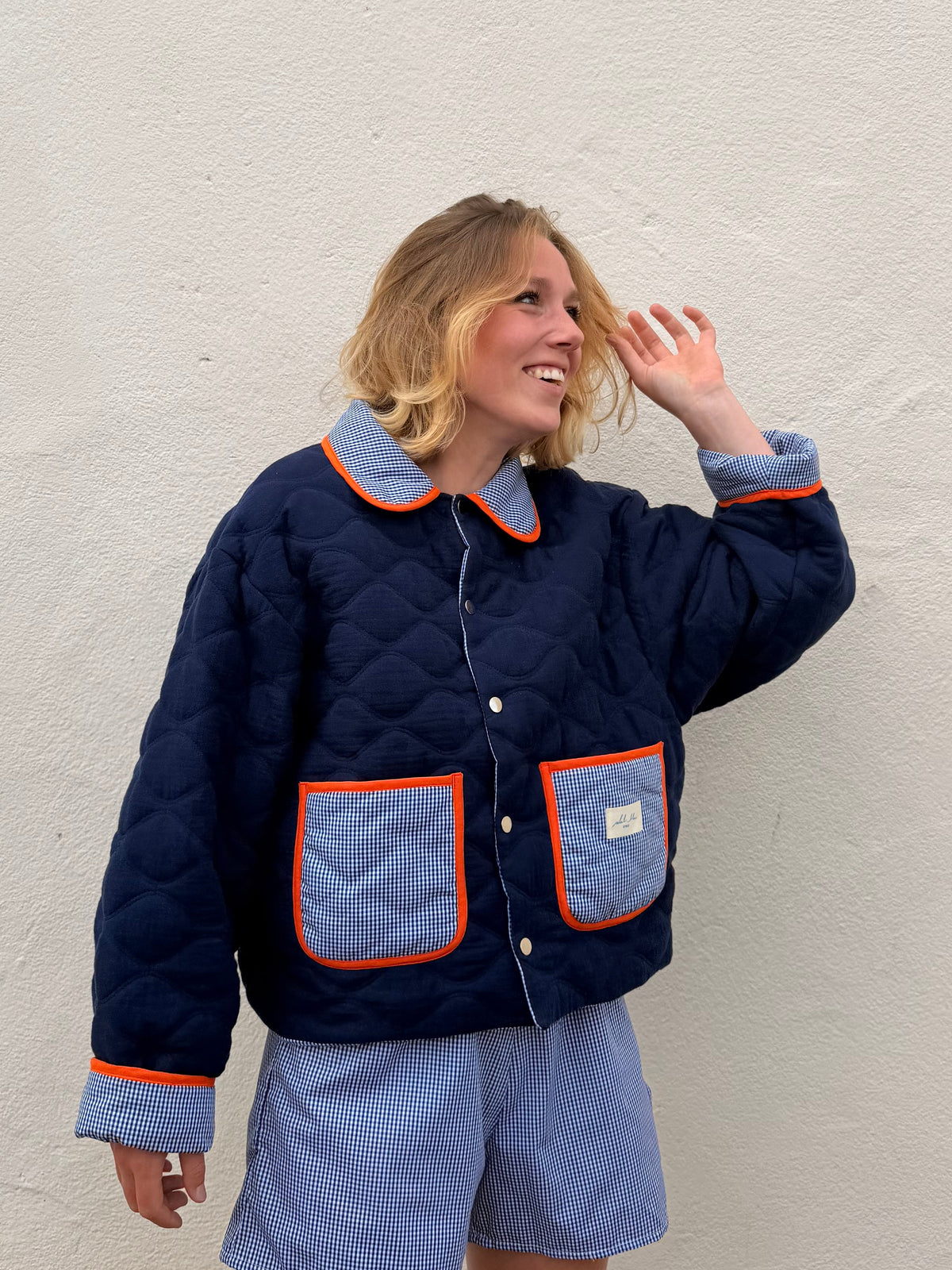 Veste réversible matelassée marine/vichy bleu/biais orange