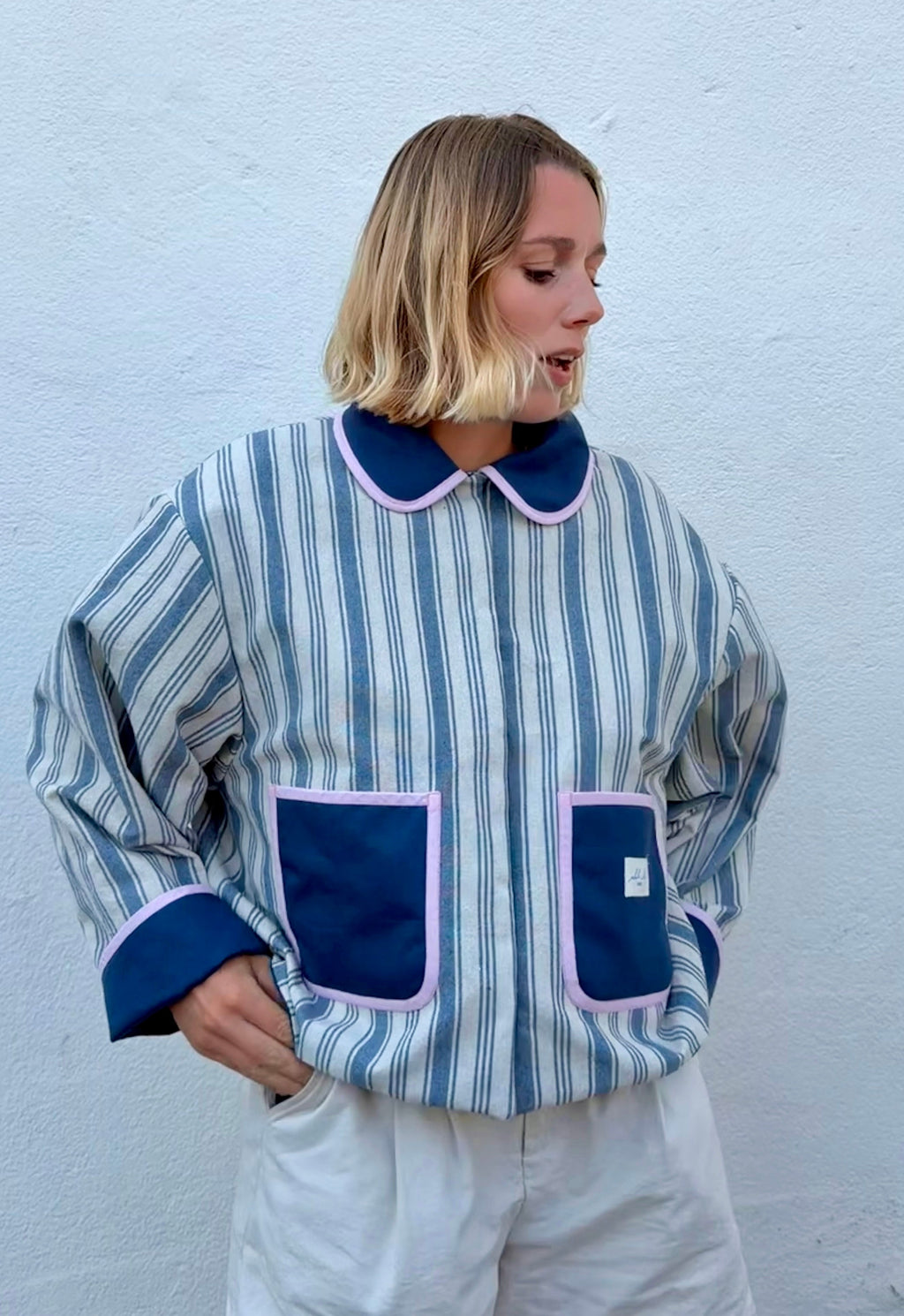 Veste réversible ligné bleu/ bleu marine/ biais rose