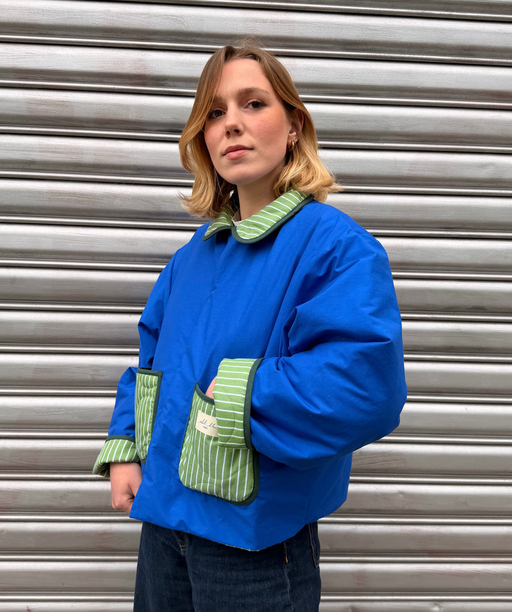 Veste matelassé réversible vert ligné/bleu