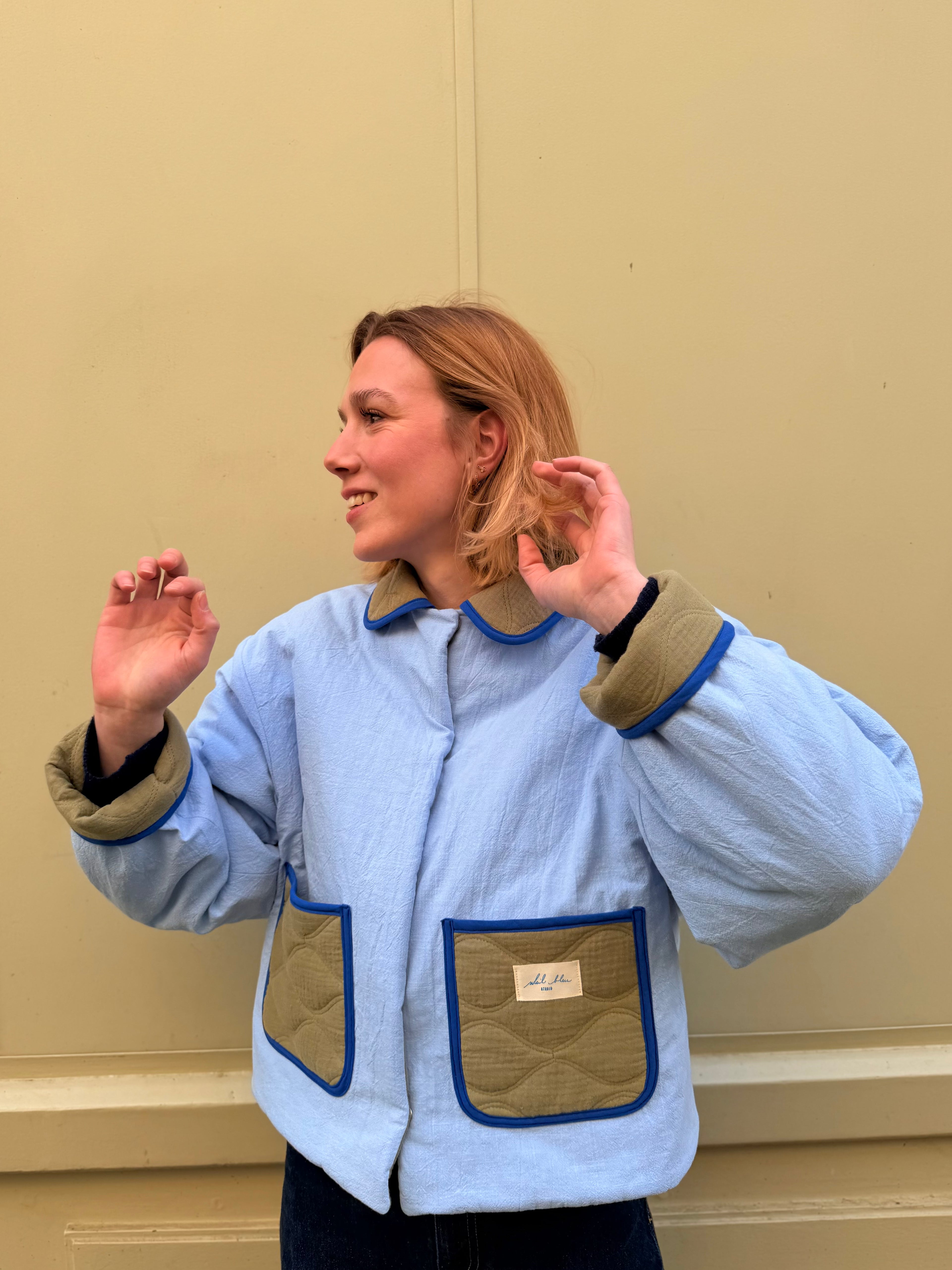 Veste matelassée réversible kaki/bleu ciel