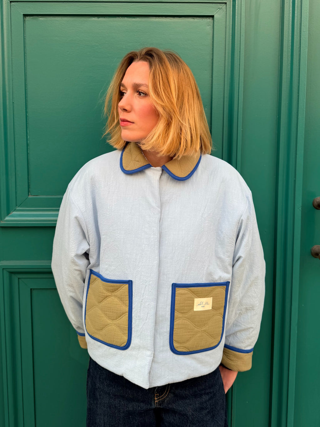 Veste matelassée réversible kaki/bleu ciel