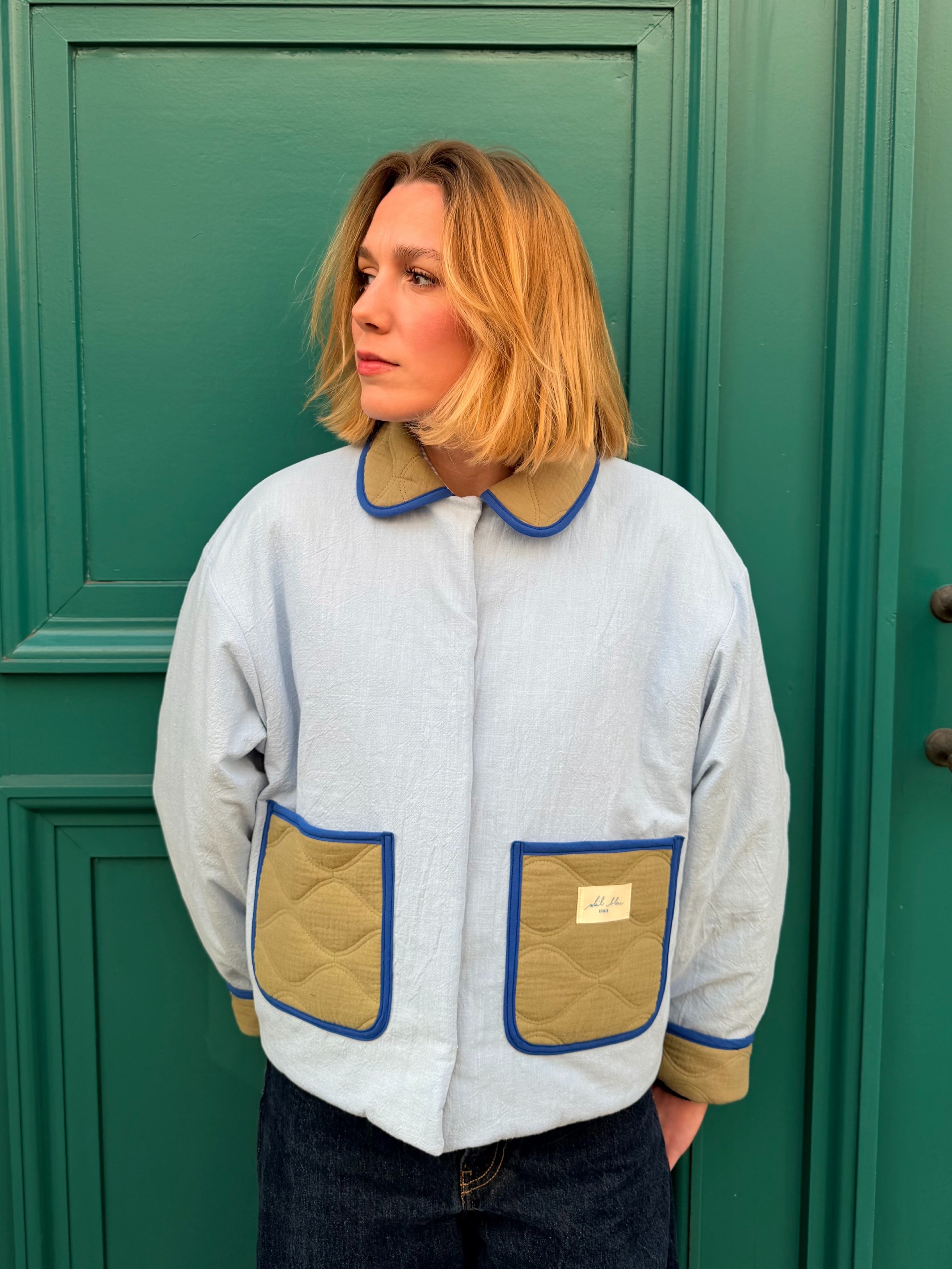 Veste matelassée réversible kaki/bleu ciel