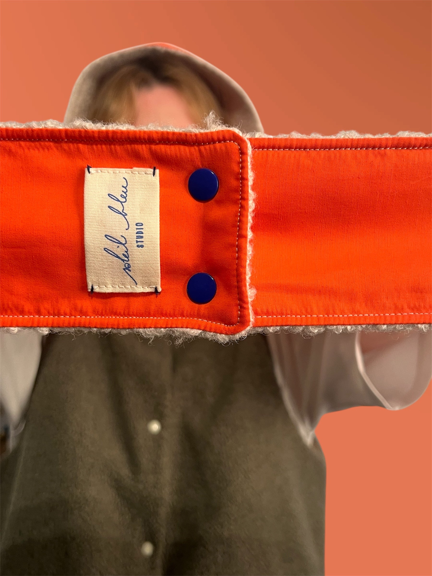 capuche moumoute écrue/orange