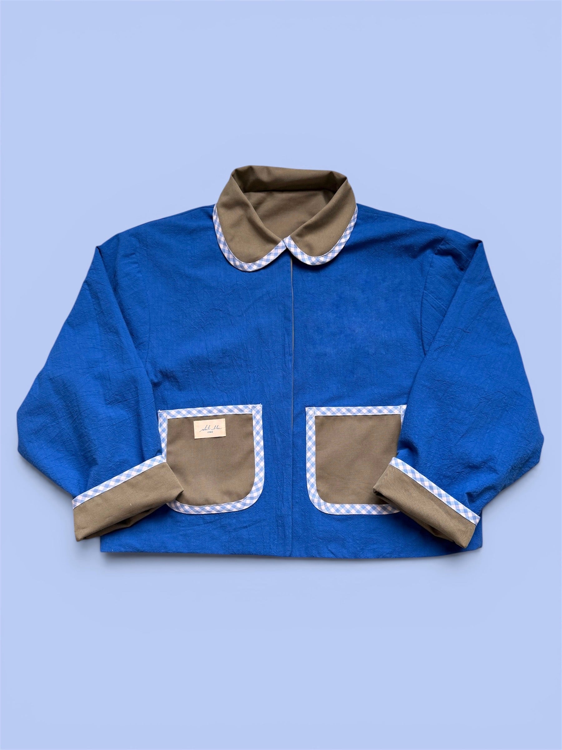 Veste réversible kaki/bleu roi